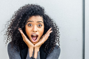 Young woman expressing surprise