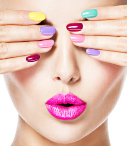 woman  with colored nails and pink lips