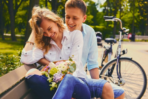 A couple on a dating in a summer park.